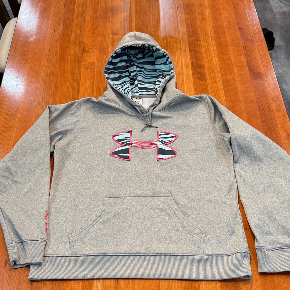 Woman’s used under Armour pullover sweatshirt, size large